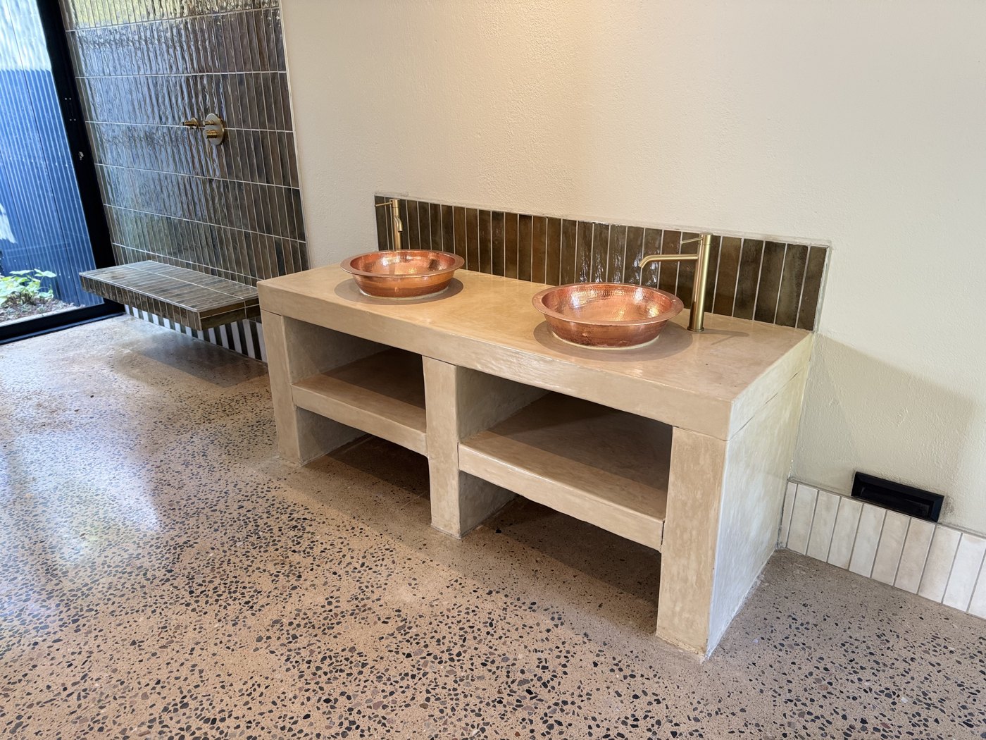 Twin hammered copper vessel basins with brass taps — Madikwe lodge