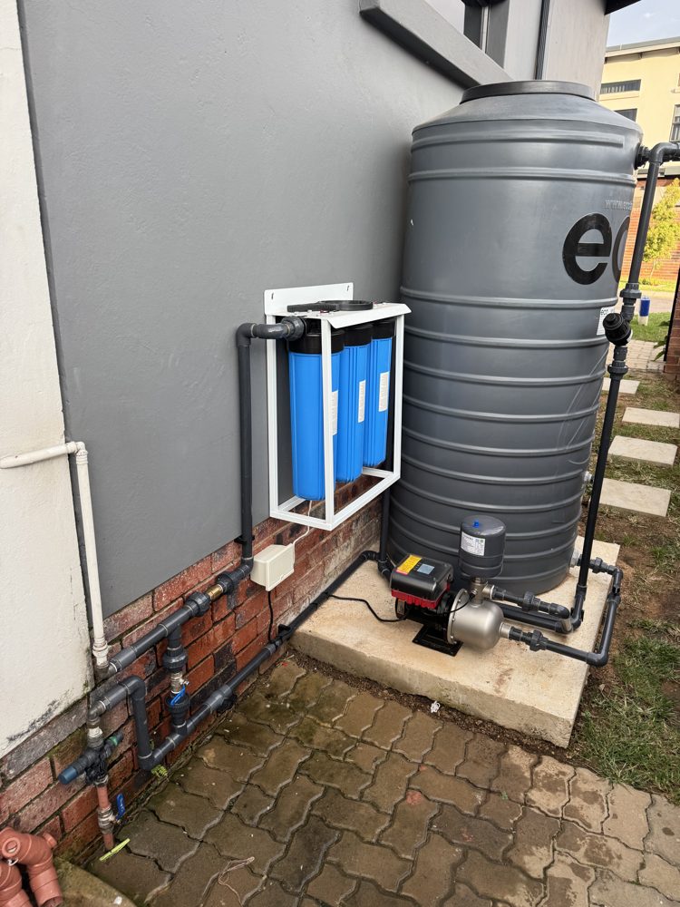Booster pump and water storage tank installation